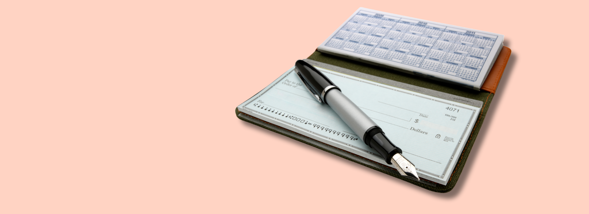 A checkbook and pen