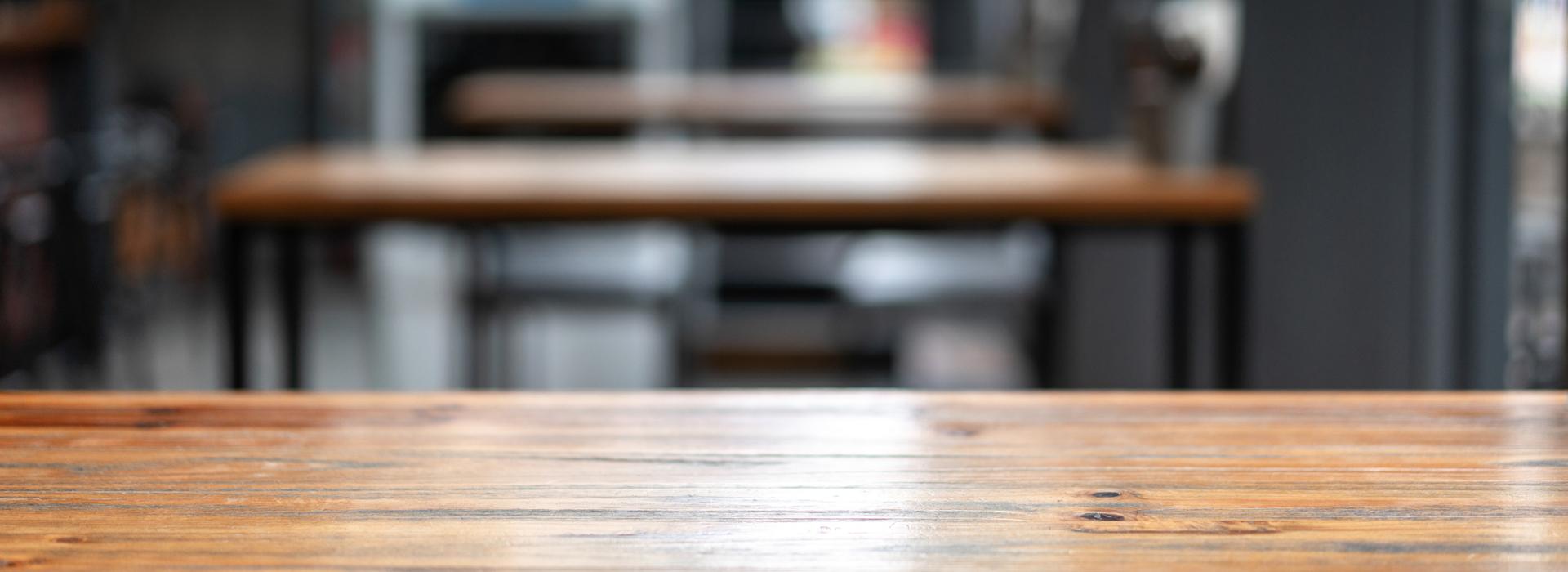 Tables in a coffee shop (blurred image)
