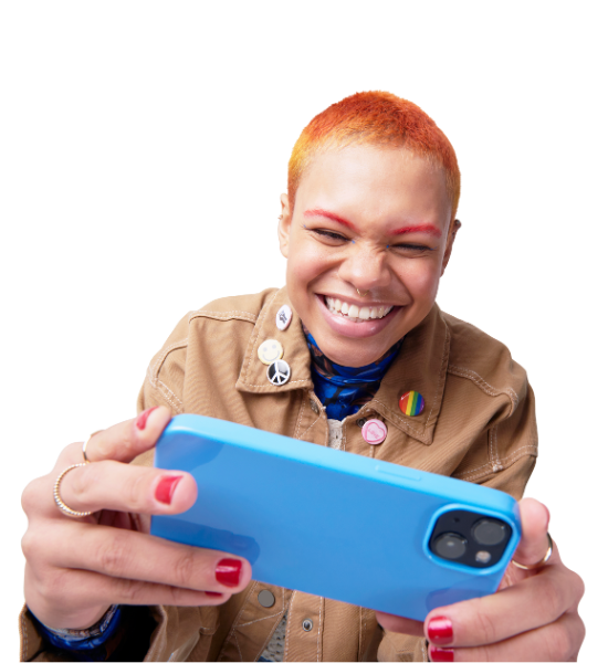 Woman smiling looking at mobile phone