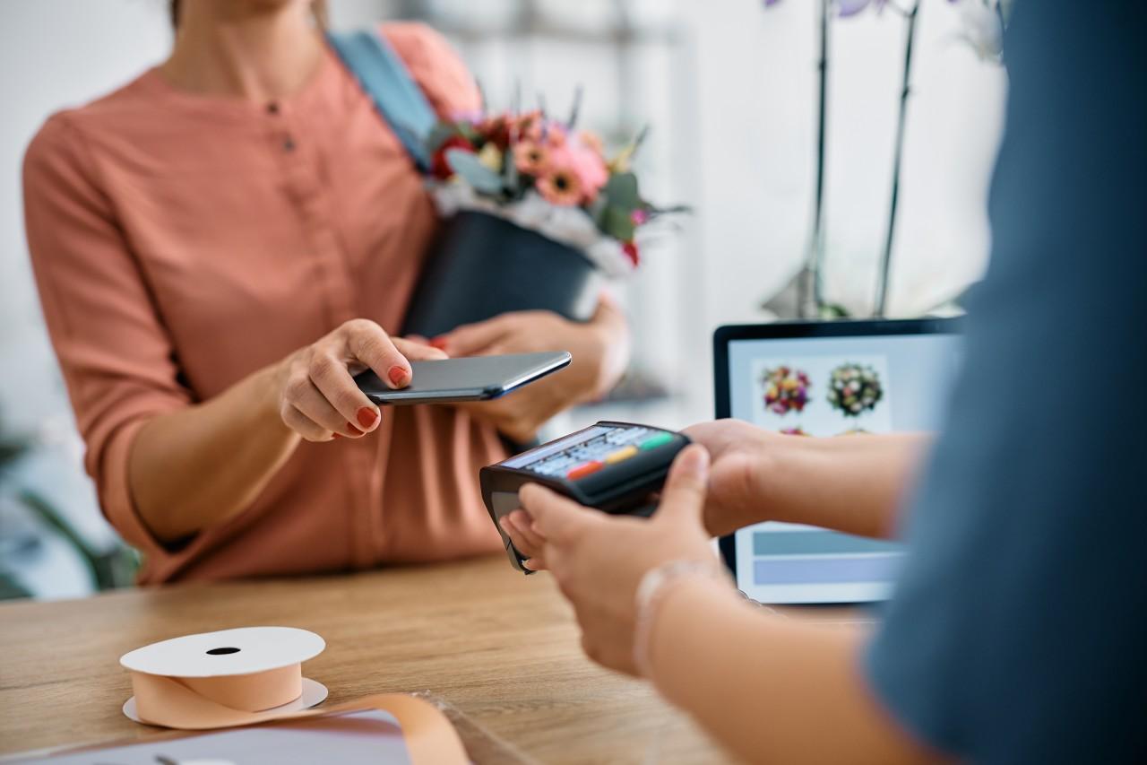 Person paying with their phone